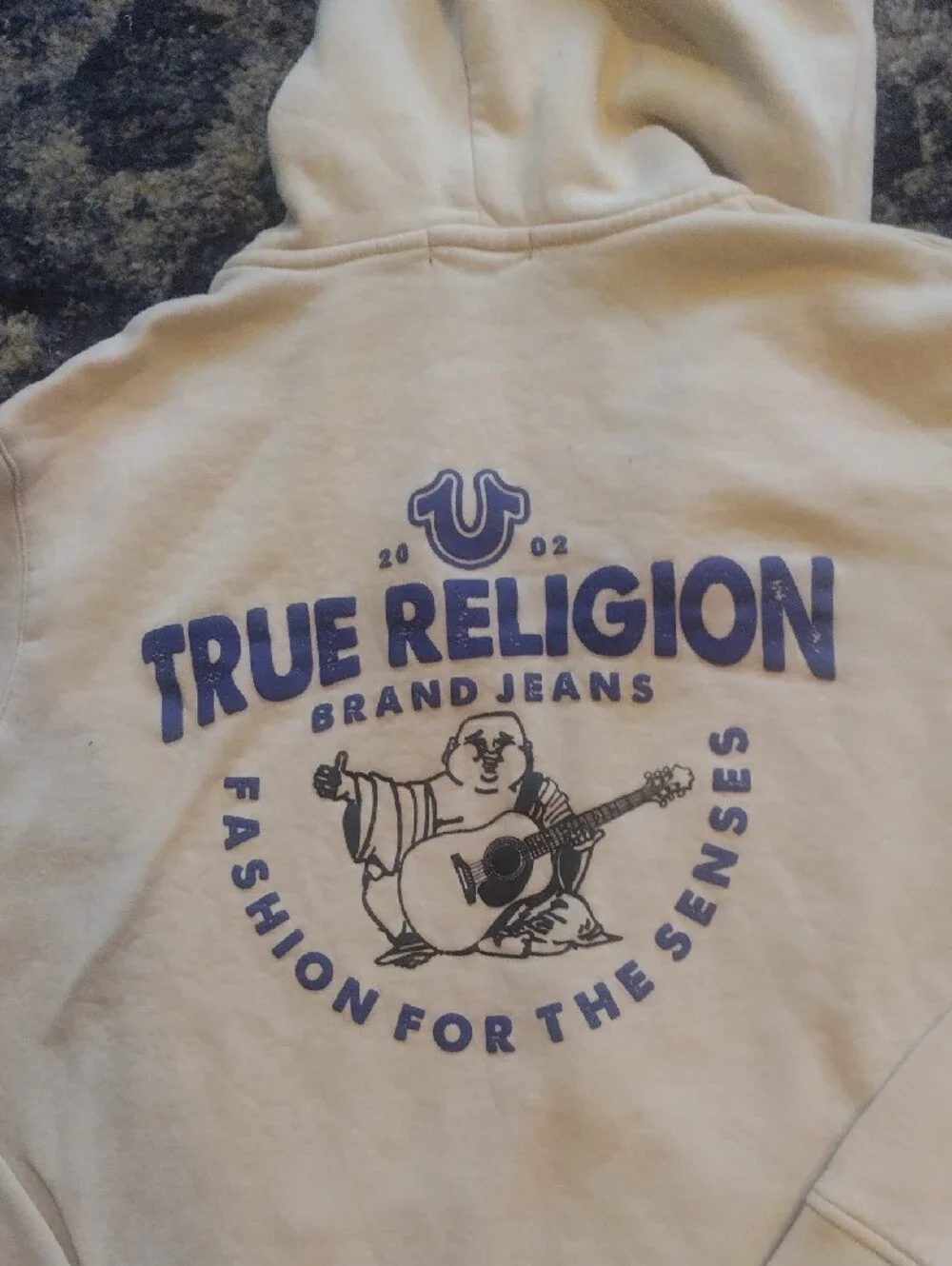 True Religion Cream Pullover Hoodie with Blue Logo Graphic